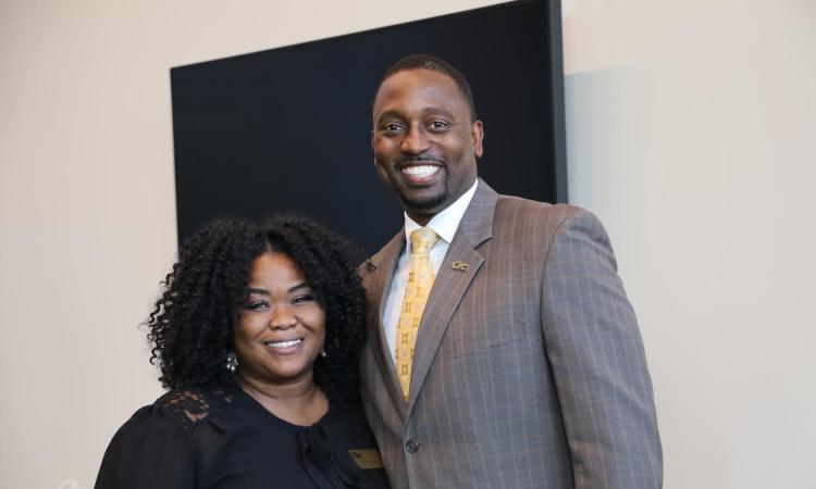 Damon P. Williams standing with Ruth Pierre