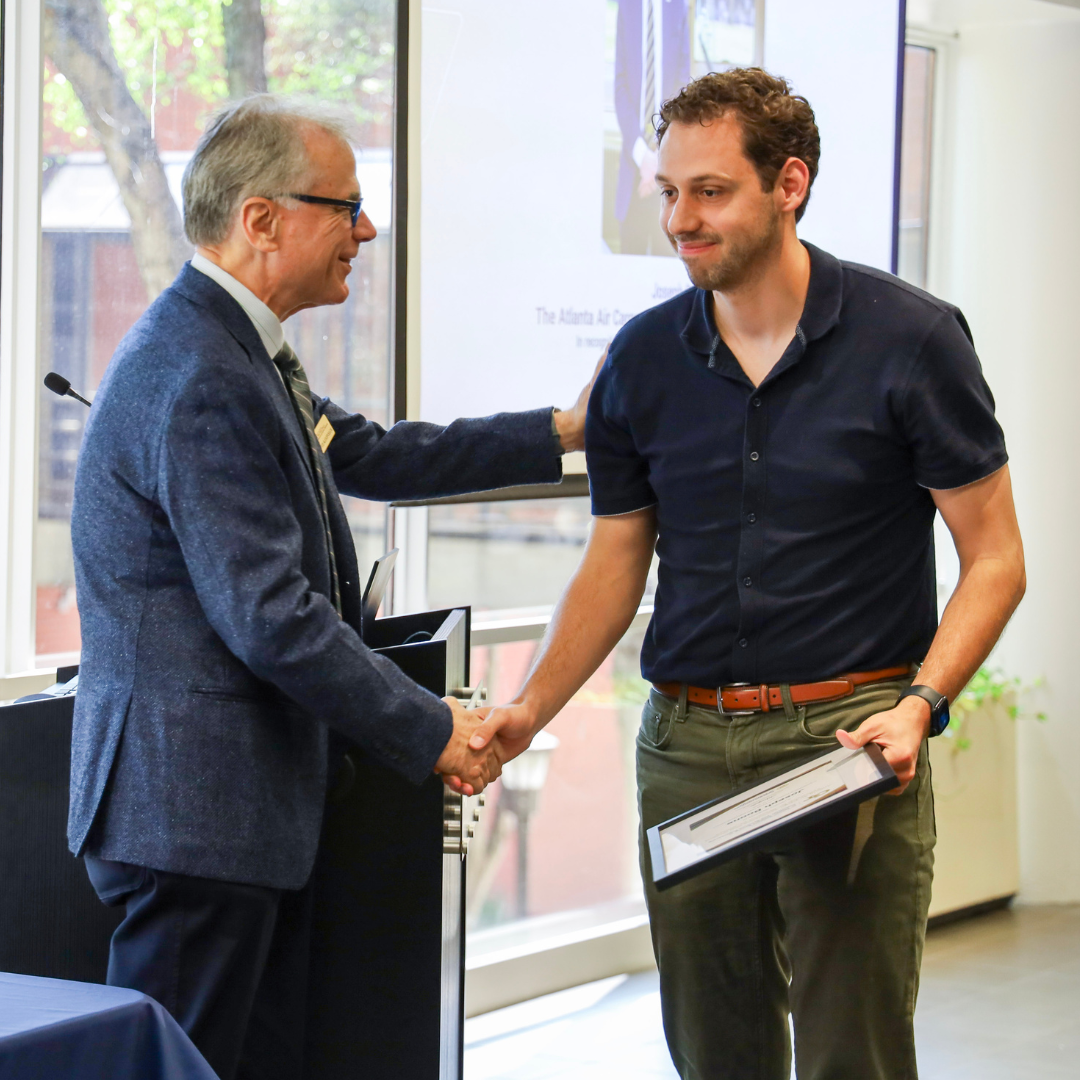 Joseph Boone accepting his award