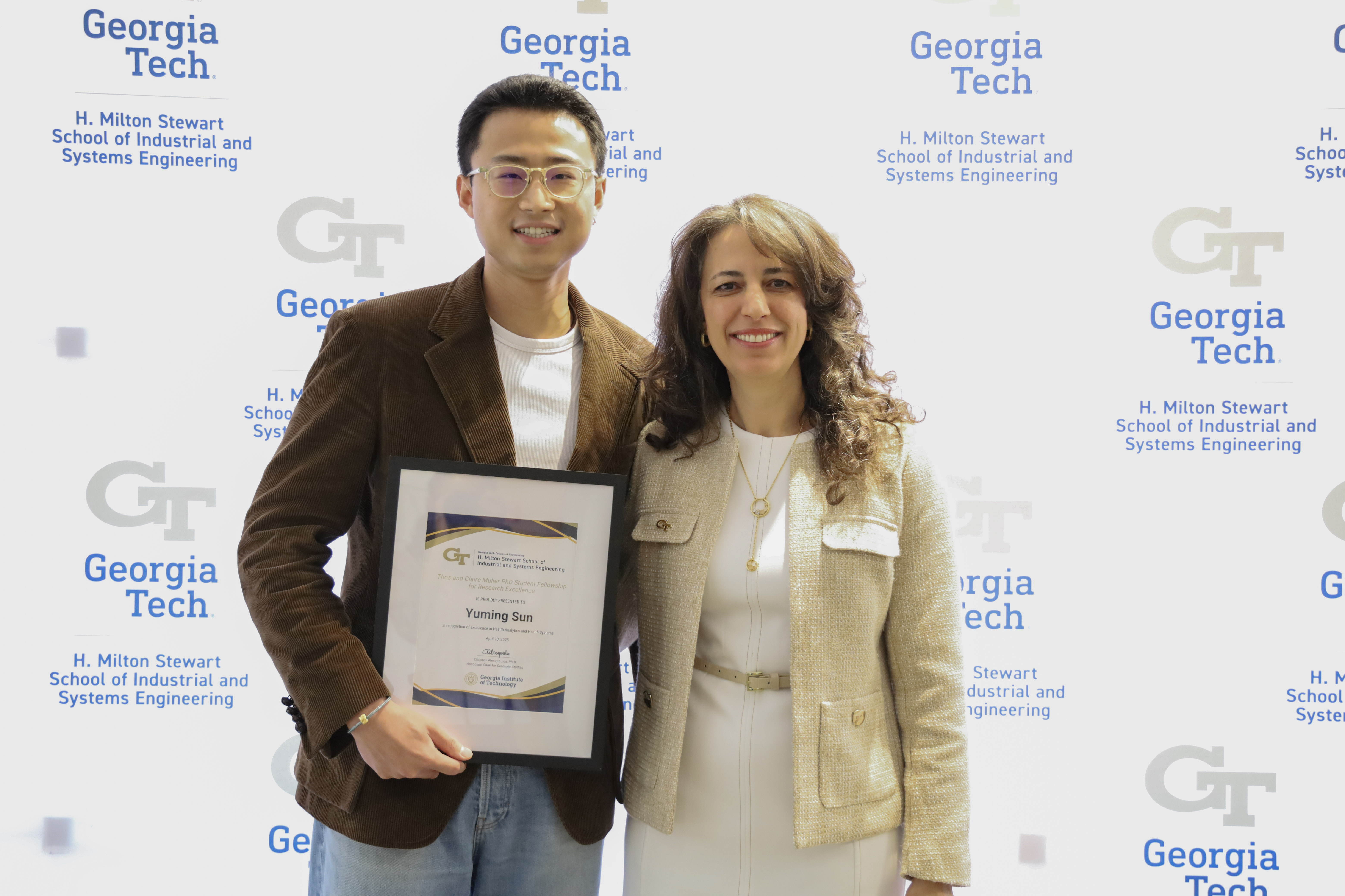 Yuming Sun and ISyE Chair, Pinar Keskinocak